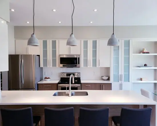 quartz countertop in a modern white kitchen