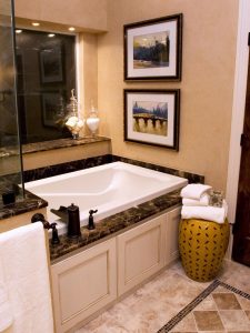 bath tub surrounded with granite